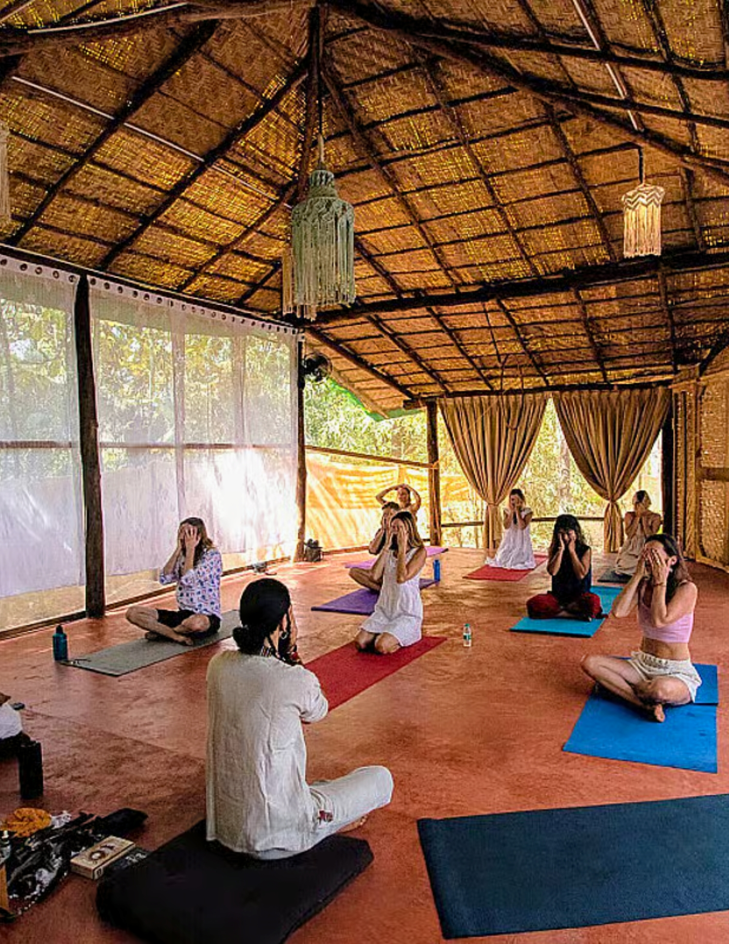 Group yoga and meditation session at Retreat Inn Kerala Ayurveda and yoga retreat surrounded by nature.